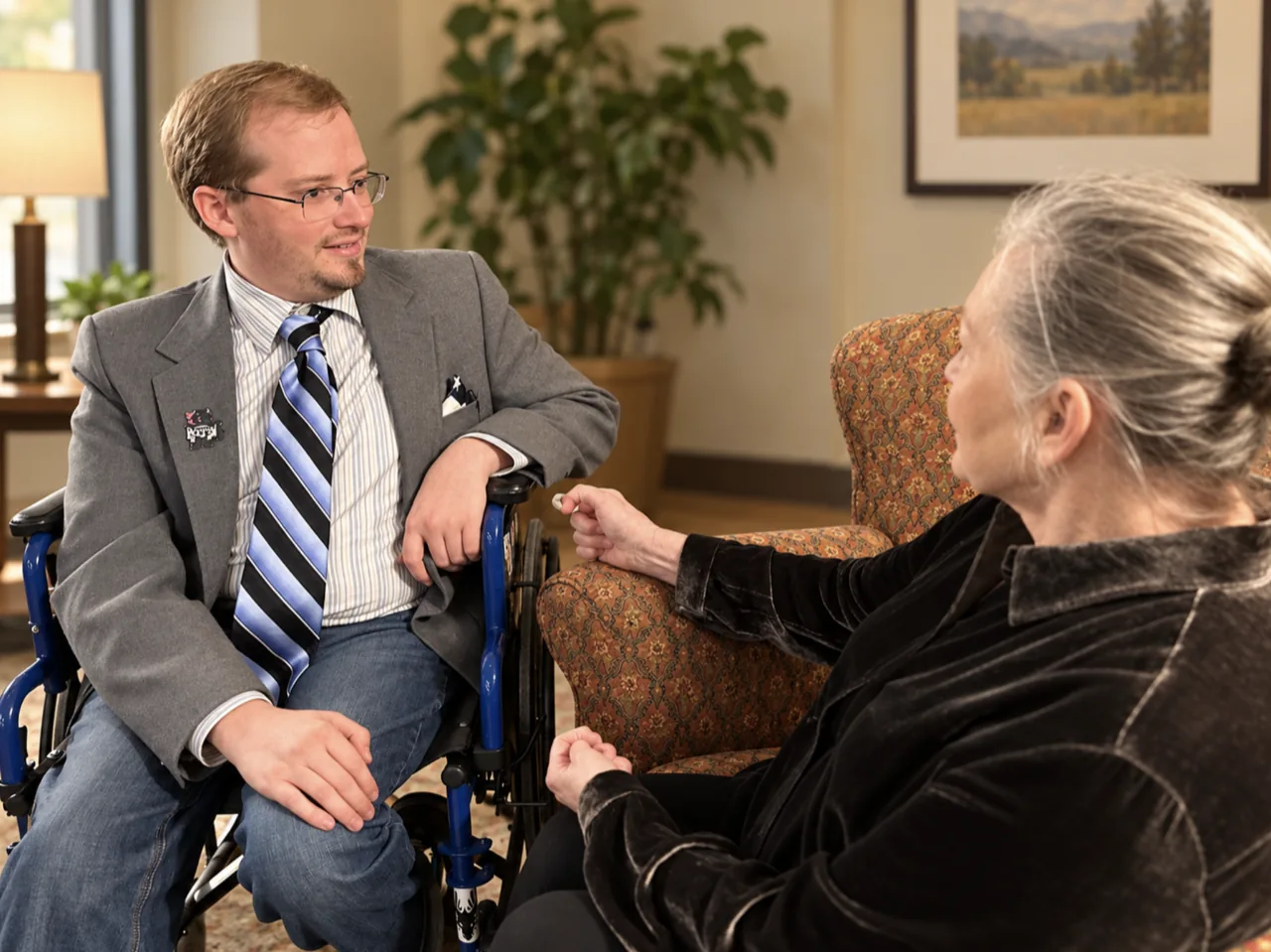 Neil Fox speaking with a business owner